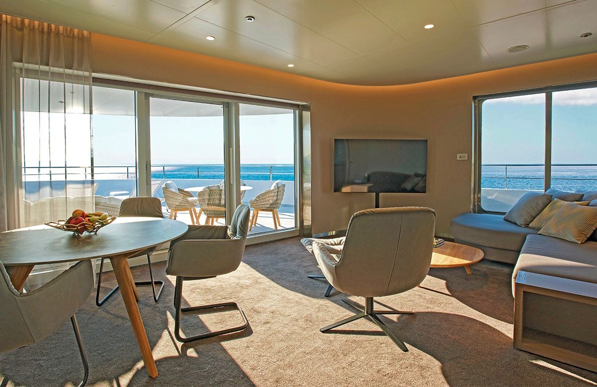 A large and spacious separate lounge in the top cabin grade on board an Emerald Cruises yacht