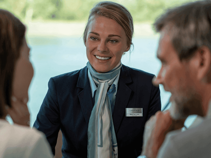 Two guests and cruise director